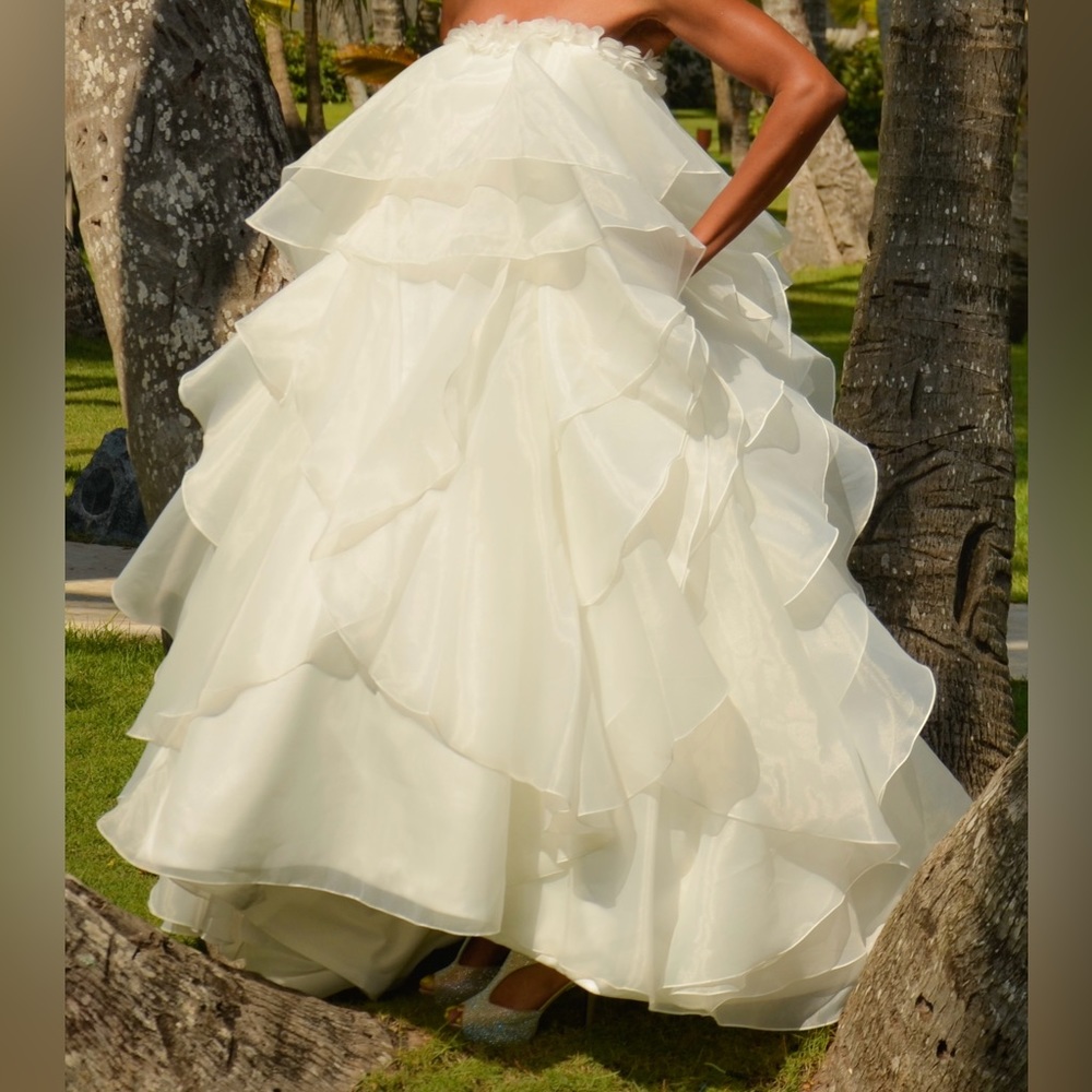 Strapless ruffle and chiffon tulle beach wedding gown.